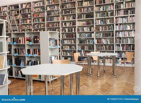 View of Bookshelves and Tables Stock Photo - Image of bookshelves ...