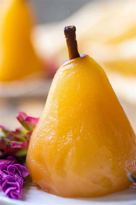 Poached Pears A Simple But Elegant Dessert Simmered In Honey Vanilla And Spices Pear Pears