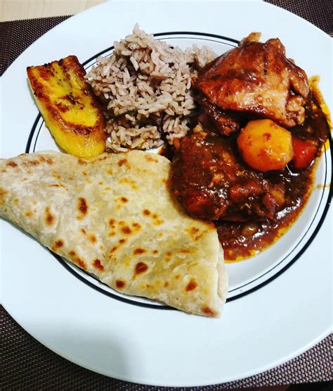 I Ate Jamaican Dinner Of Brown Stew Chicken Roti Plantains Rice