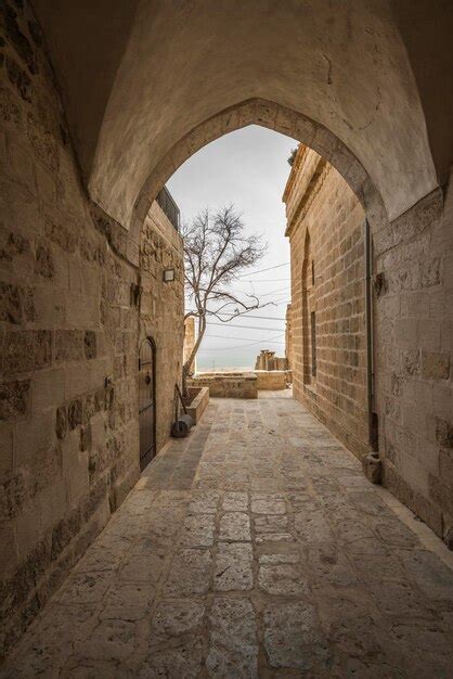 Premium Photo Passageway Between Stone Buildings Old Stone Arch And