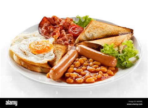 English breakfast - toast, egg, bacon and vegetables Stock Photo - Alamy