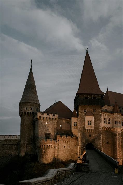 Medieval stone castle under gloomy sky · Free Stock Photo