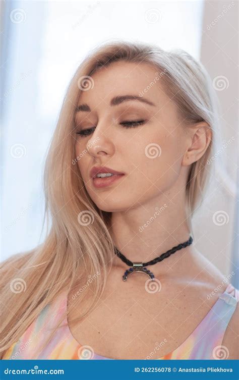 Portrait Of Pretty Blonde Girl In Colorful Hippie Top With Bohemian