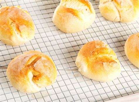 Bunch Of Whole Fresh Baked Wheat Buns With Wheat Ears On Dark W Stock