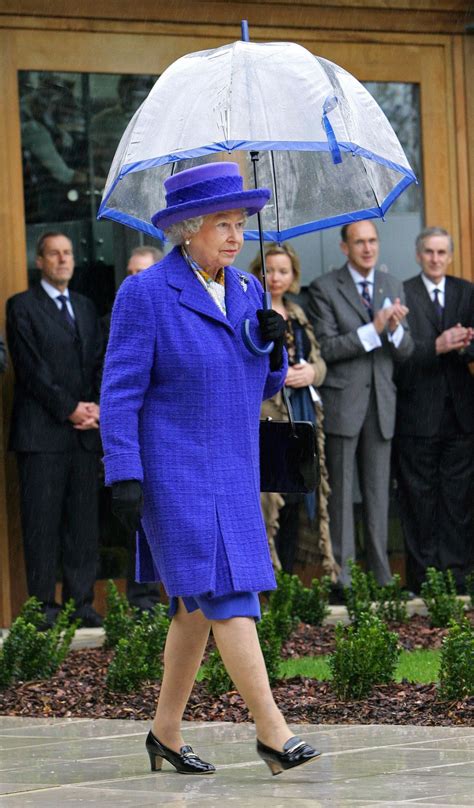 20 of Queen Elizabeth's Most Fashionable Umbrella Moments