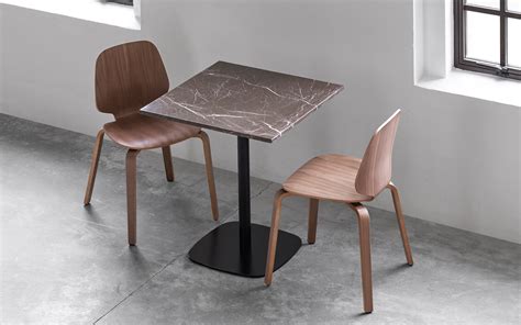 simple  elegant cafe table consists   black cylindrical steel