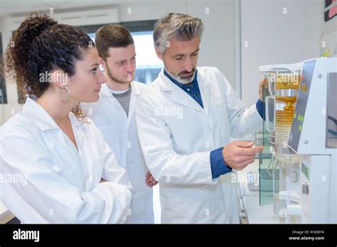 science students with teacher during course Stock Photo - Alamy