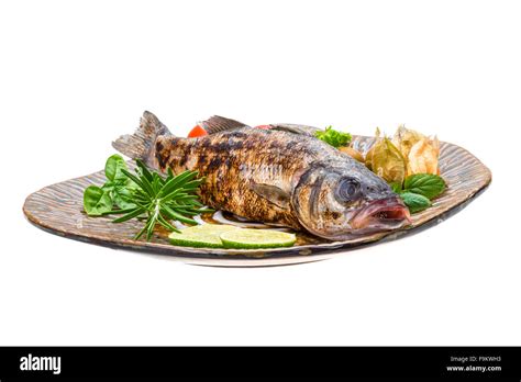 Roasted Seabass With Rosemary And Herbs Stock Photo Alamy