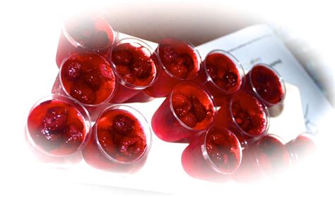 Strawberry Jelly Shots With Raspberries On Top