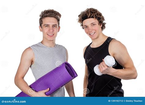 Two Handsome Guys Doing Fitness Workout With Weights Isolated On White