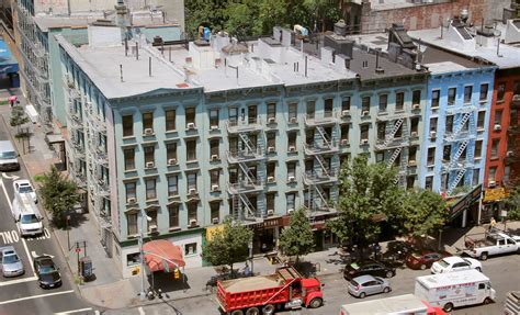 an aerial view of a city street with cars and trucks