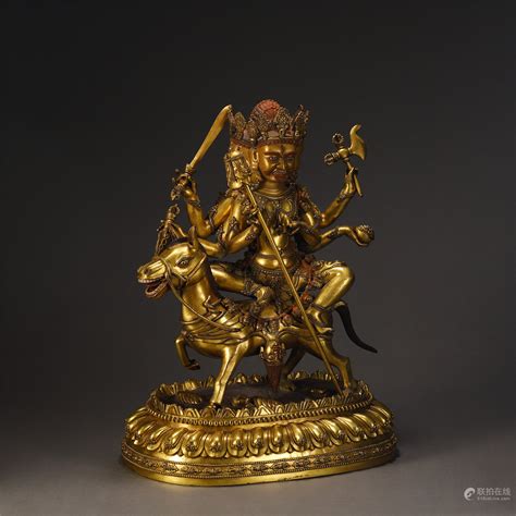 51BidLive A LARGE TIBETAN GILT BRONZE PROTECTOR