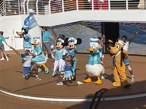 Mickey Mouse And Pals Debut Shimmering New Outfits For Disney Cruise Line S Silver Anniversary