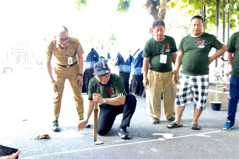 Infopublik Lestarikan Permainan Tradisional Dengan Lomba Balogo