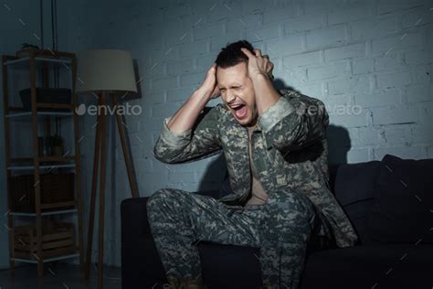 Irritated Military Veteran Screaming While Suffering From Emotional