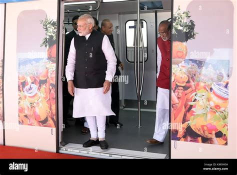 Indian Prime Minister Narendra Modi, steps off a metro car during the ...