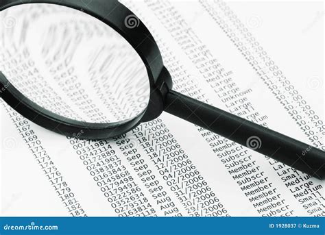 Magnifying Glass And Business Data Royalty Free Stock Photography