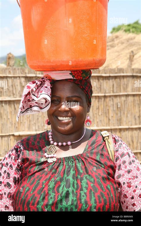 African Woman Carrying Water