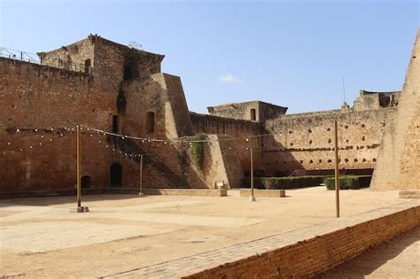 Premium Photo | Courtyard of the castle of niebla, historical fortification in the town of ...