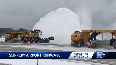 Fleet of massive plows tackle snow at MKE airport