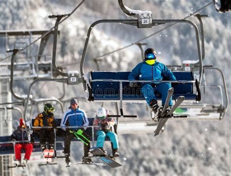 Skier Sitting On Ski Lift Chair Or Chairlift Editorial Photography