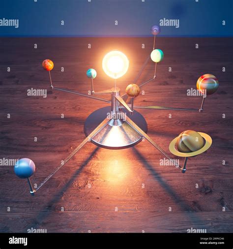 Toy Solar system model planets on the spinning arms rotating around the ...