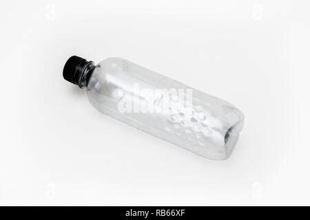 An Empty Generic Single Use Plastic Water Bottle On A White Background