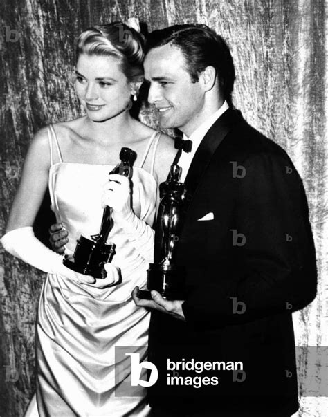 Image of Grace Kelly and Marlon Brando at Academy Awards 1955