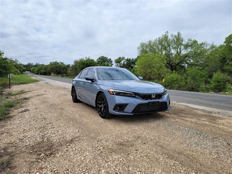 Just picked up a 2023 Civic Hatch Sport Touring : r/Honda