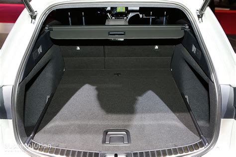 Toyota Corolla Hybrid Wagon Has Giant Trunk and Even Bigger Tablet in ...