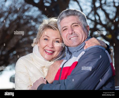 Mature Couple Hugging Each Other In Park And Are Happy Together Focus