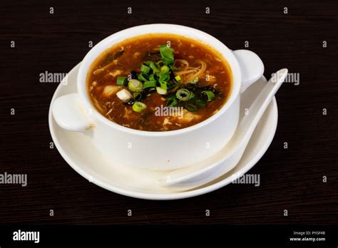 Chinese cuisine - soup with seafood Stock Photo - Alamy