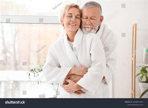 Mature Couple Hugging After Shower Bathroom Stock Photo 2438075433 Shutterstock