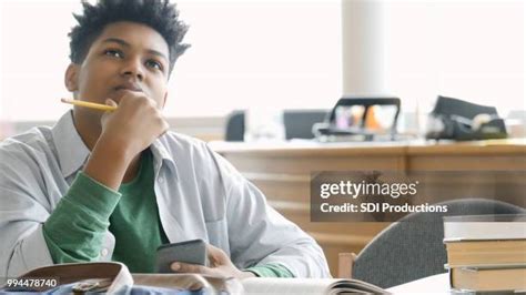 High School Student Thinking Photos And Premium High Res Pictures