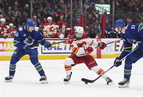 Toffoli Scores Nd Goal In Ot Flames Beat Canucks