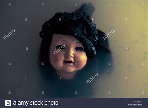 Creepy doll face Stock Photo - Alamy