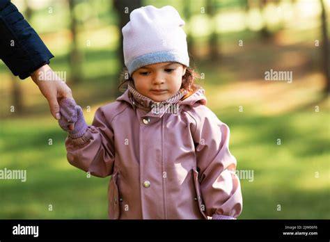 Child Sad Holding Adults Hand Hi Res Stock Photography And Images Alamy