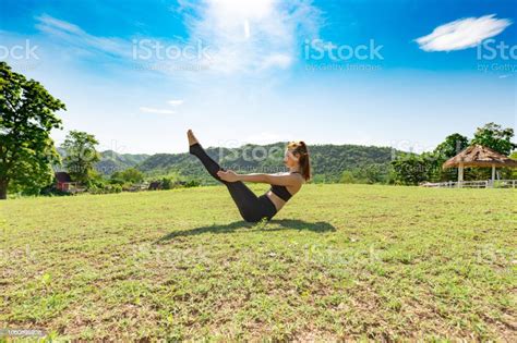 Beauty Asian Woman Practice Yoga Boat Pose Or Navasana Pose Stretching