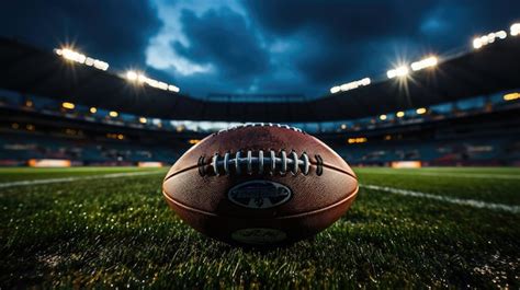 Premium Photo American Football On The Grass