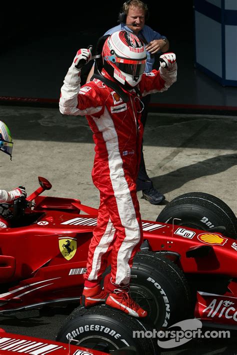 Race winner and 2007 World Champion Kimi Raikkonen celebrates at ...