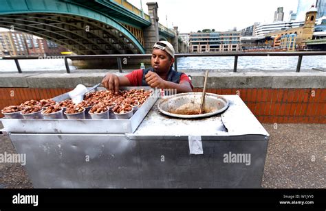 Man Selling Nuts On Hi Res Stock Photography And Images Alamy