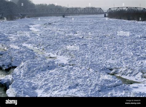 Dangerous Ice Jam On The River Bridge In Danger Poland Stock