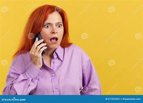 Surprised Mature Redheaded Woman Talking To The Mobile Stock Image Image Of Comfortable