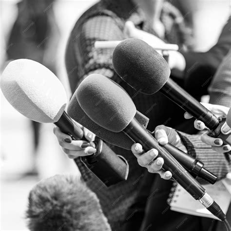 Premium Photo | News reporters interviewing an unrecognizable people outdoors