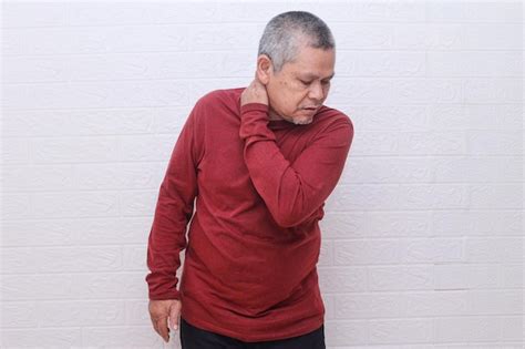 Premium Photo Elderly Man Suffering From Neck Pain At Home Old Man