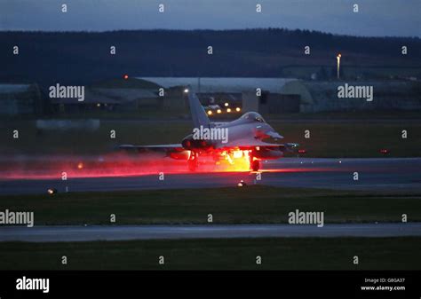 A Eurofighter Typhoon jet takes off from RAF Lossiemouth in Scotland ...