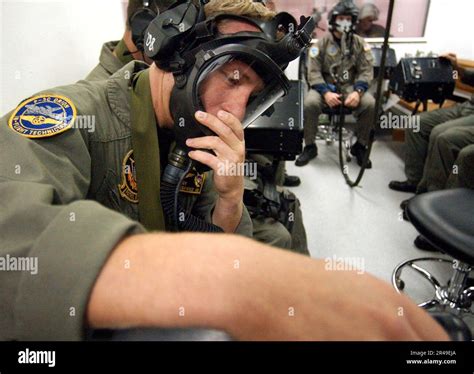 Us Navy Aviation Electronics Technician St Class Checks His Oxygen