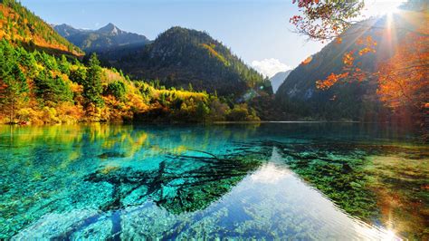 Beautiful Scenery View Of Mountains Yellow Green Trees Reflection On