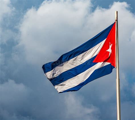 Waving Cuban Flag Flying Over Revolution Square In Havana Cuba Stock