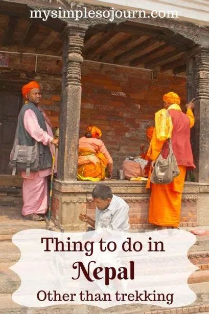 People In Orange Turbans Standing On Steps With Text Overlay That Reads